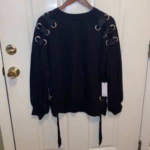 Black sweater with puff sleeves